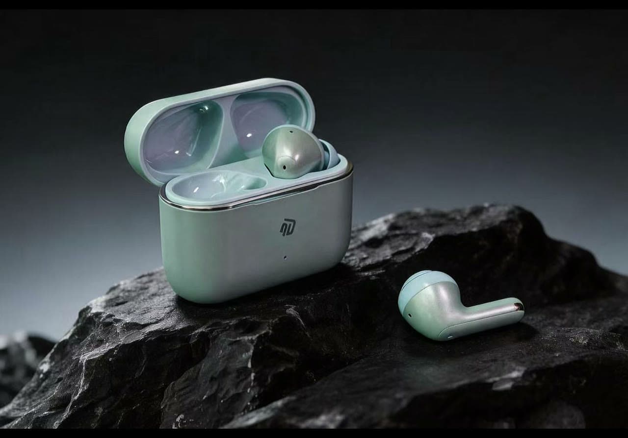 A1X earbuds and charging case in silver green
